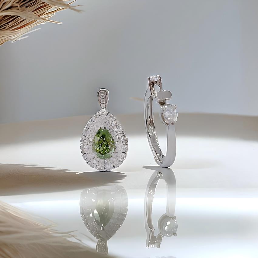Detachable green pear double halo pendant head beside its 18K white gold ring mount