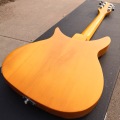 325 electric guitar has varnish on its fingerboard, light yellow paint, 527mm bridge to nut, small double-rocking