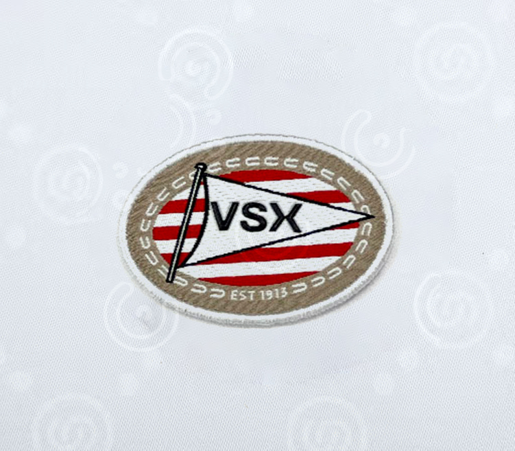 High frequency label with embroidered logo