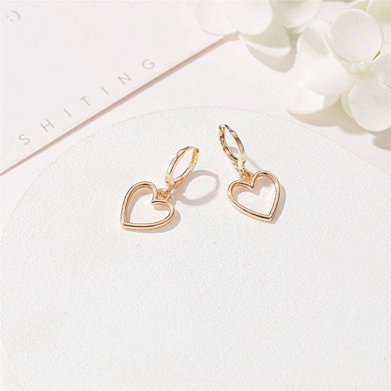 Simple hollow love earrings small fresh wild metal peach heart earrings