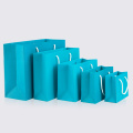 10pcs / blue paper bag holiday gift clothing gift packaging shopping bag belt support printing 1 color simple logo