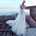 Champagne Tulle Boho Wedding Dresses 2020 Sexy Backless Princess Bridal Dress Lace Appliques 3D Flowers Beach Wedding Gowns
