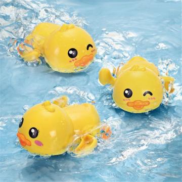 1pcs Little duck baby bath toy children bathing swimming playing water clockwork toy