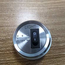 Elevator button light switch