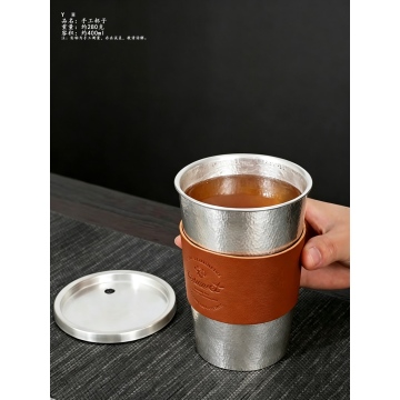 Hammered Silver Tea Cup with Elegant Artisan Design