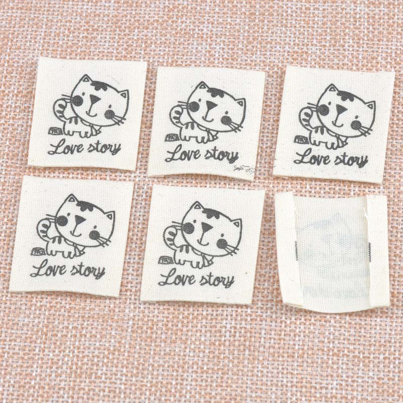 Stock clothing label tags Beige tagging labels cat with love story Clothing Shoes Bags Washable Garment Tags 32x36mm50pcs cp1529