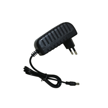 1PCS AC/DC Adapter 12V 2A Switching Power Supply Charger For guitar foot pedal Effect adapter Reverse Polarity Negative Inside