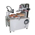 Rotating screen printing machine with robot downloading