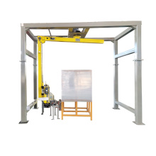 Combined automatic pallet wrapper with top sheet dispenser