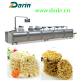 Extruded rice cereal bar compression molding machine