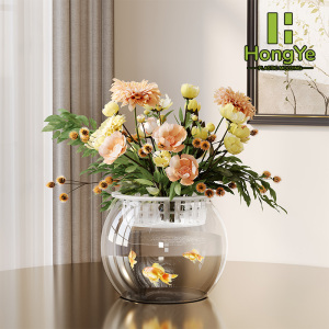 Clear cylindrical plant pot with inner basket