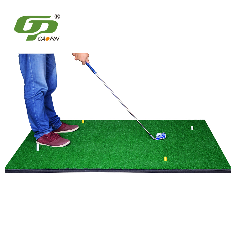 Golf Rubber tee on driving rang mat