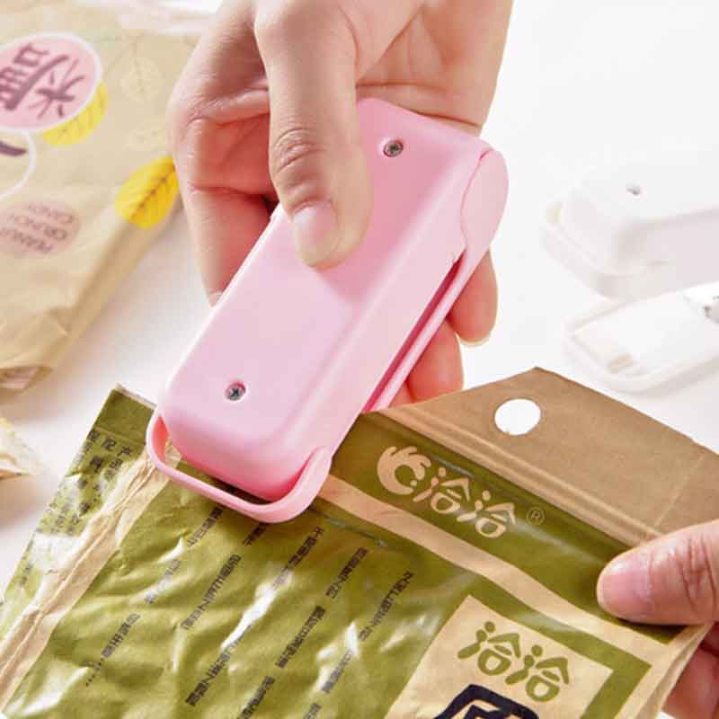 Mini sealing machine snack plastic bag sealing machine household hand pressure heat sealing machine small sealing machine